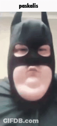 Batman Costume Making Funny Face Eyes Closed GIF