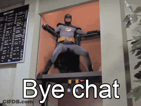 Batman Costume Says Bye Chat In Front Of Directory Sign GIF