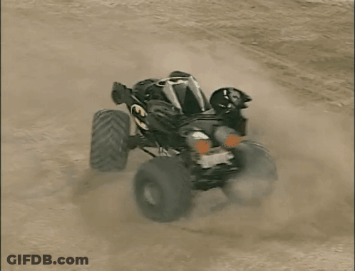 Batman Monster Truck Driving On Dirt Track GIF