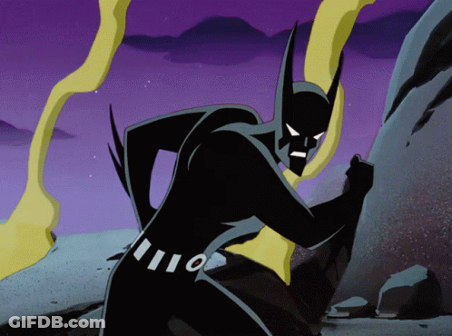Batman Pushing Large Rock GIF