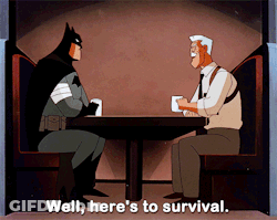Batman Sitting At Table Talking To Another Man GIF