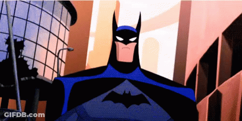 Batman Standing In Front Of Building GIF