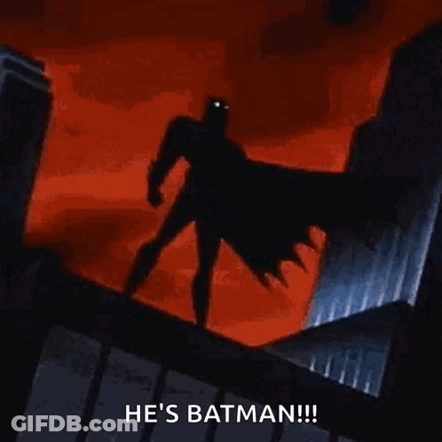 Batman Standing On Building Saying He's Batman GIF