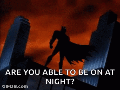Batman Standing On Building Under Lightning Storm GIF