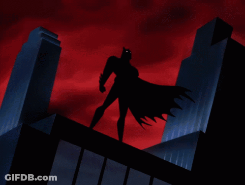 Batman Standing On Building With Lightning Bolt GIF
