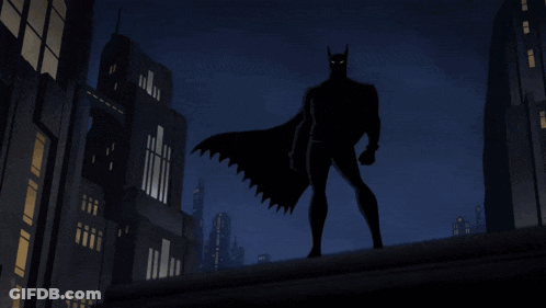 Batman Standing On Rooftop With Lightning GIF