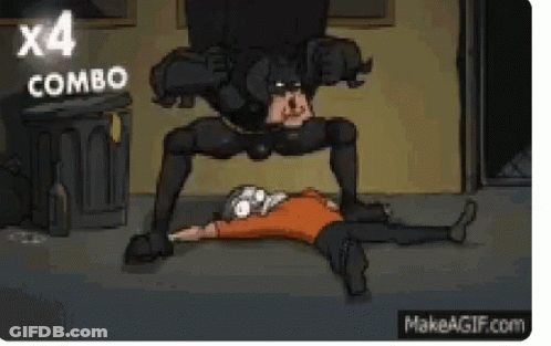 Batman Standing Over Man Lying On Ground GIF