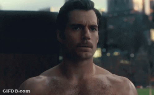 Batman Superman And Wonder Woman Are Standing Next To Each Other In Front Of A Cloudy Sky GIF
