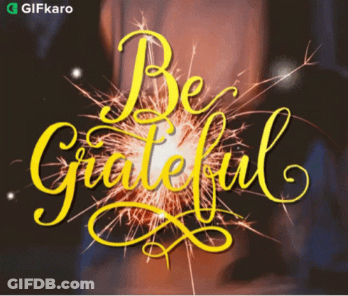 Be Grateful Sign With Sparklers GIF