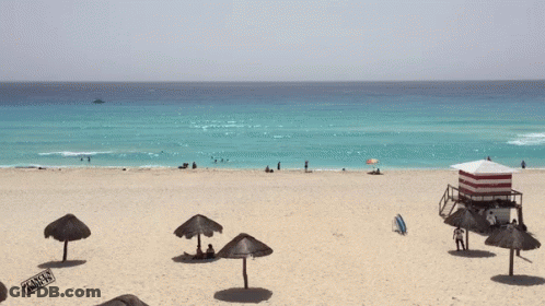 Beach With Umbrellas And Lifeguard Tower GIF