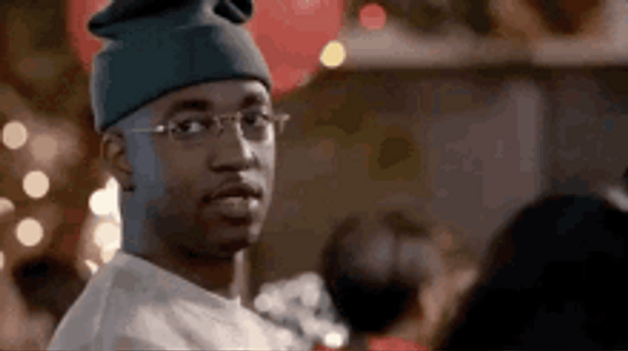 Beanie Guy Looking Around GIF