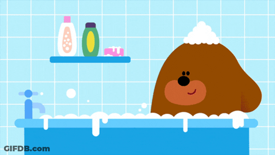Bear Holding Rubber Duckie Bubble Bath GIF