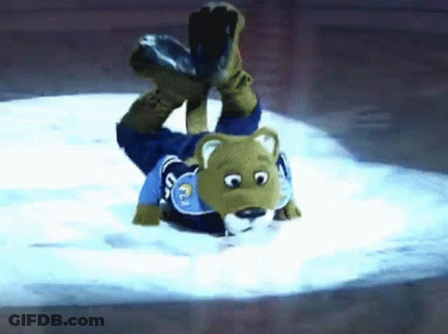 Bear Mascot Laying On Back In Snow GIF