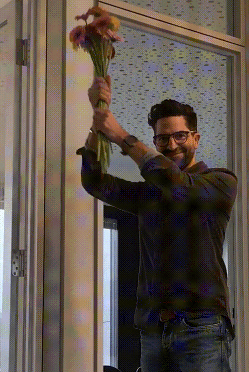 Beard Man Giving Flowers GIF