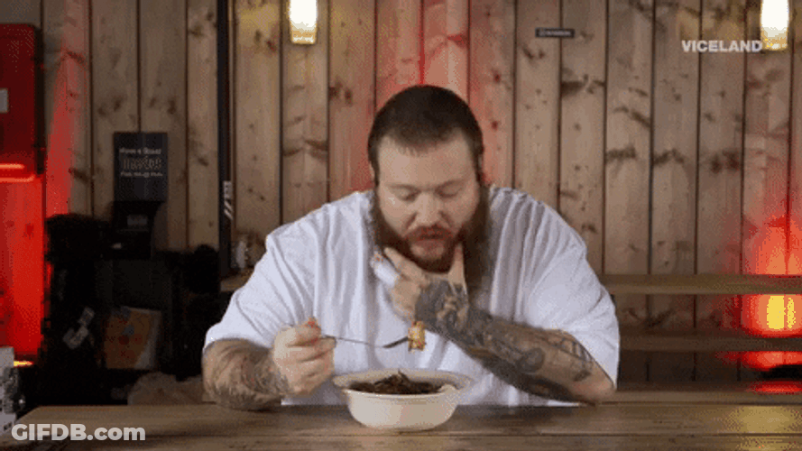 Beard Man Takes A Bite GIF
