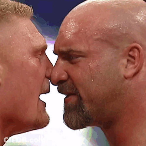 Bearded Bald Man Kissing Another Man GIF