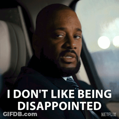 Bearded Cartoon Character In Suit And Tie GIF