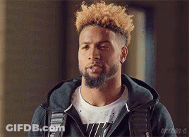 Bearded Curly Haired Man In Hoodie And White Shirt GIF