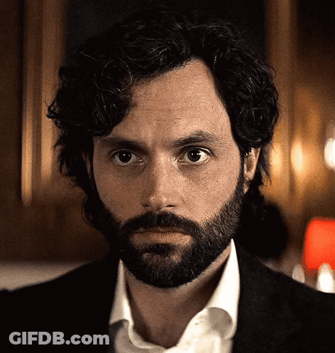 Bearded Curly Man In Suit And White Shirt GIF
