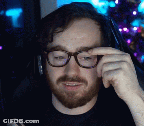 Bearded Man Adjusting Glasses GIF
