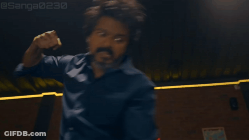 Bearded Man Arms Outstretched In Dark Room GIF