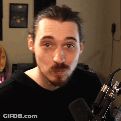 Bearded Man At Microphone GIF
