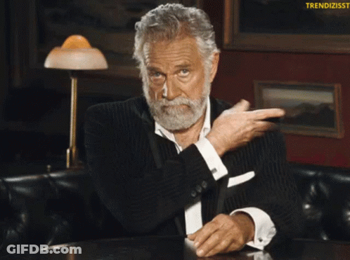 Bearded Man At Table Saying Trendizisst GIF