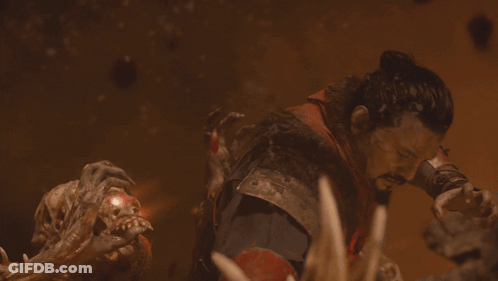 Bearded Man Attacked By Red-Eyed Monster GIF