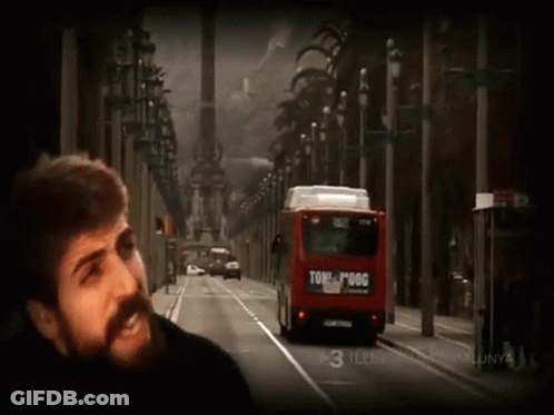 Bearded Man Beside Red Bus Saying Tome Pogg GIF