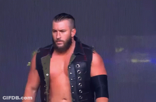 Bearded Man, Black Vest, Black Arm Band GIF