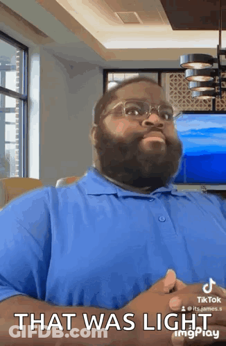 Bearded Man Blue Shirt Glasses Says That Was Light GIF
