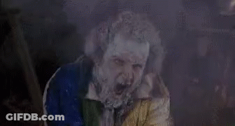 Bearded Man Covered In Ice In Blue Jacket GIF