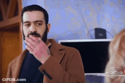 Bearded Man Covering Mouth GIF