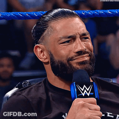 Bearded Man Crying Holding Microphone With W GIF