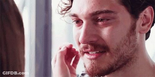 Bearded Man Crying While Woman Touches His Nose GIF