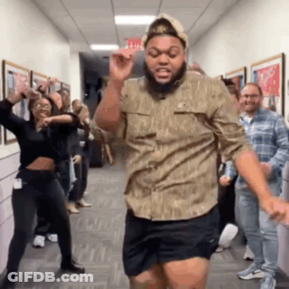 Bearded Man Dancing In Hallway GIF