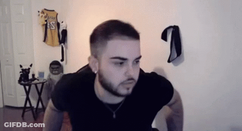 Bearded Man Doing Push Ups Next To Basketball Jersey GIF