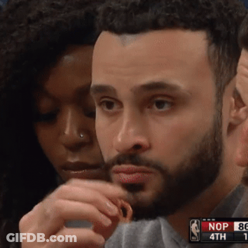 Bearded Man Eating Snack Watching Nop Vs Bc GIF