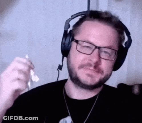 Bearded Man Glasses Holding Microphone Wearing Headphones GIF