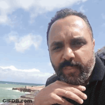 Bearded Man Hand On Neck GIF