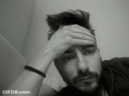 Bearded Man Hand To Forehead Black And White GIF
