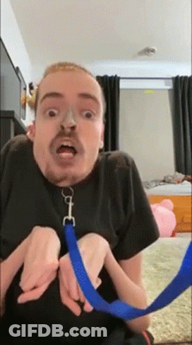 Bearded Man Holding Blue Leash GIF