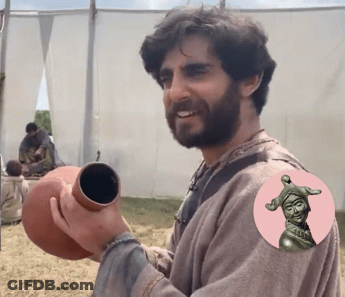 Bearded Man Holding Clay Pot GIF