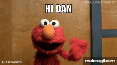 Bearded Man Holding Flowers In Front Of Onlydans.com Sign GIF