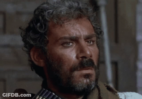 Bearded Man Holding Gun GIF