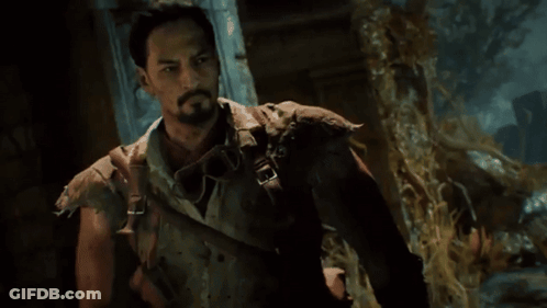Bearded Man Holding Gun GIF