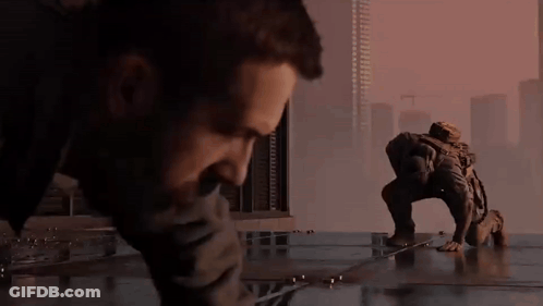 Bearded Man Holding Gun With Price On Jacket GIF
