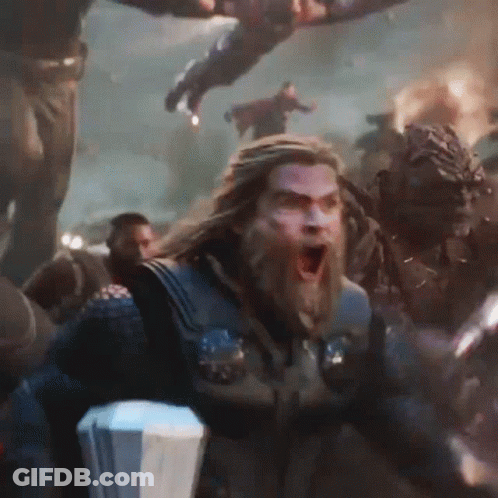 Bearded Man Holding Hammer In Crowd GIF