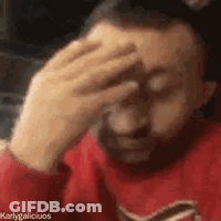 Bearded Man Holding Hand To Forehead GIF