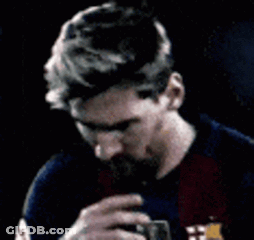 Bearded Man Holding Hand To Mouth In Blue Red Shirt GIF